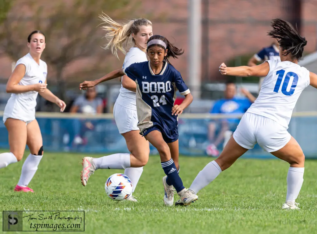 Freehold Boro Alison Espinoza - Shore Sports Insider Freshman Alison Espinoza attacks the Holmdel defense. (Photo by Tom Smith) - Freehold Boro Alison Espinoza