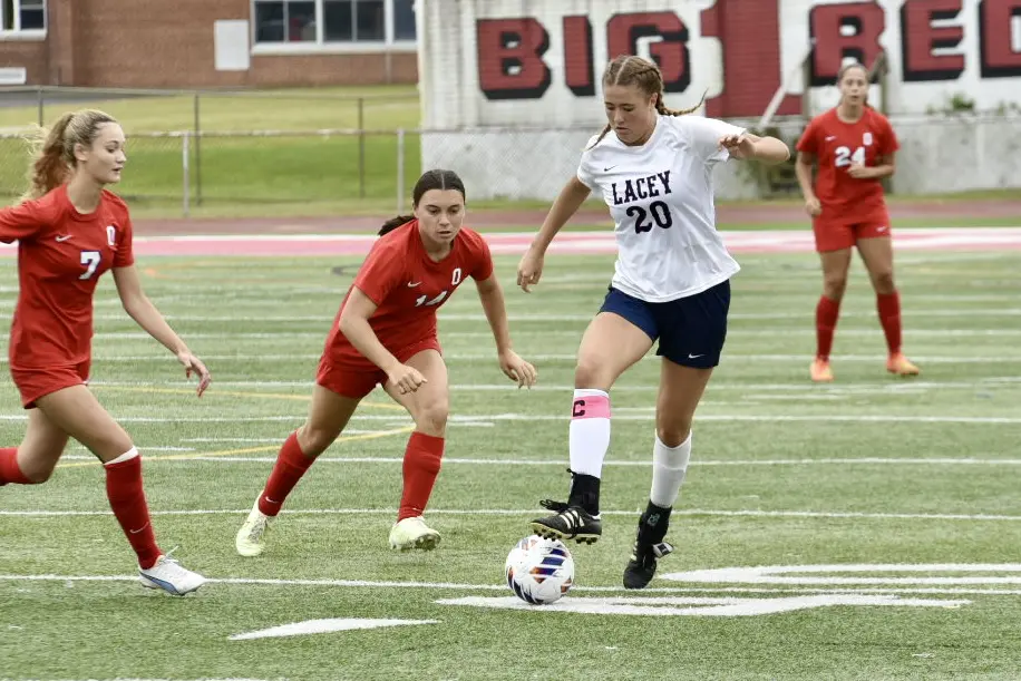 Ocean Alex Foley - Shore Sports Insider Senior Alex Foley (#14) marking Reece Paget (#20). (Photo by Eric Braun) - Ocean Alex Foley