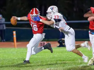 Wall linebacker Dylan Cohen (33) had two sacks in the Crimson Knights' 7-6 win over Manalapan. (Bob Badders | rpbphotography.com) - Dylan Cohen, Wall football