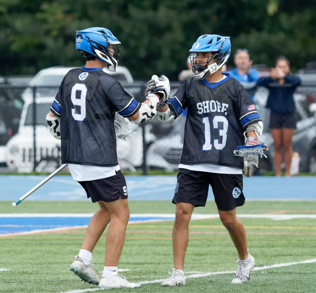 Lukas Villa and Reid Spallone, Shore Regional boys lacrosse - Shore Sports Insider Lukas Villa (13) and Reid Spallone (9) celebrate a Shore Regional goal during a 17-4 win over Toms River East in the Shore Conference Tournament quarterfinals. (Bob Badders | rpbphotography.com) - Lukas Villa and Reid Spallone, Shore Regional boys lacrosse