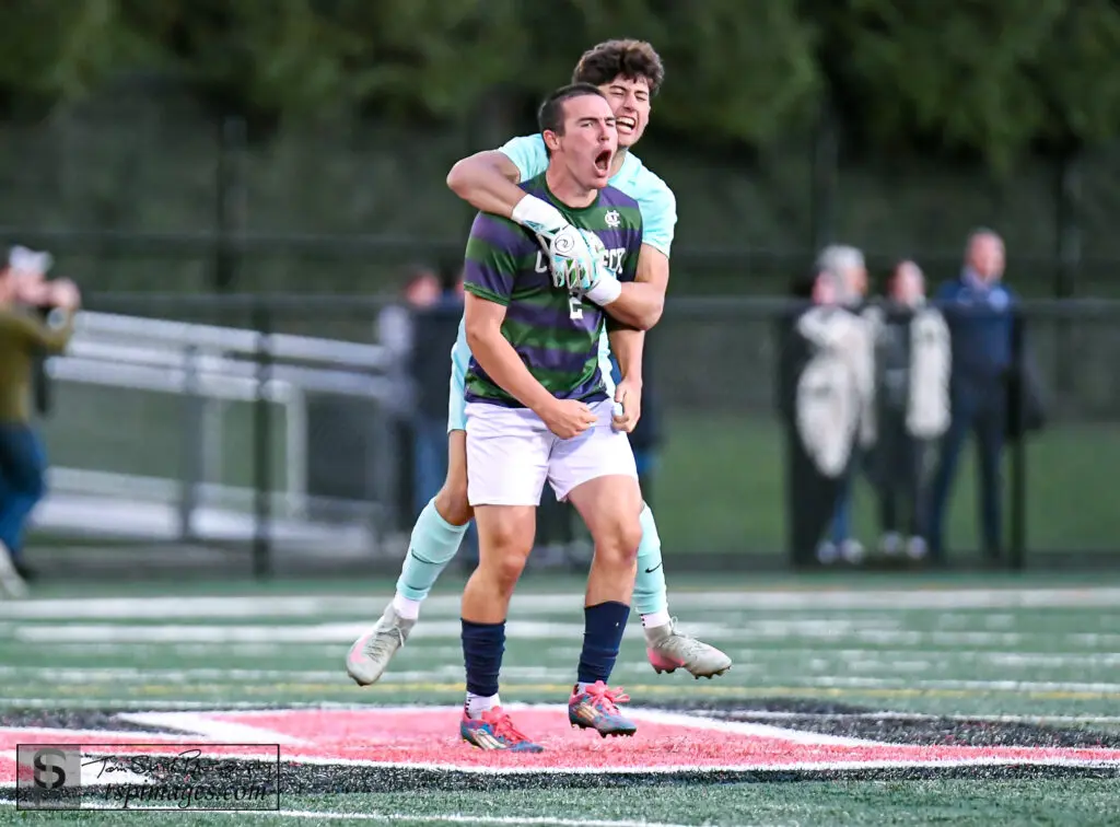 Colts Neck Ryan Spencer and Liam Collura celebrate the win - Shore Sports Insider Ryan Spencer (front) and goalkeeper Liam Collura celebrate Colts Neck's 2-1 win over Freehold Township. (Photo: Tom Smith | tspsportsimages.com) - Colts Neck Ryan Spencer and Liam Collura celebrate the win