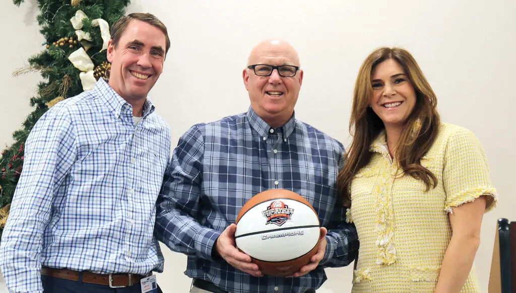RWJ Crew - Shore Sports Insider Steve Meyer presented Sarah Stetsko & Rob Cavanaugh from Community Medical Center, an RWJBarnabas Health facility tournament a KWCC Game Ball - RWJ Crew