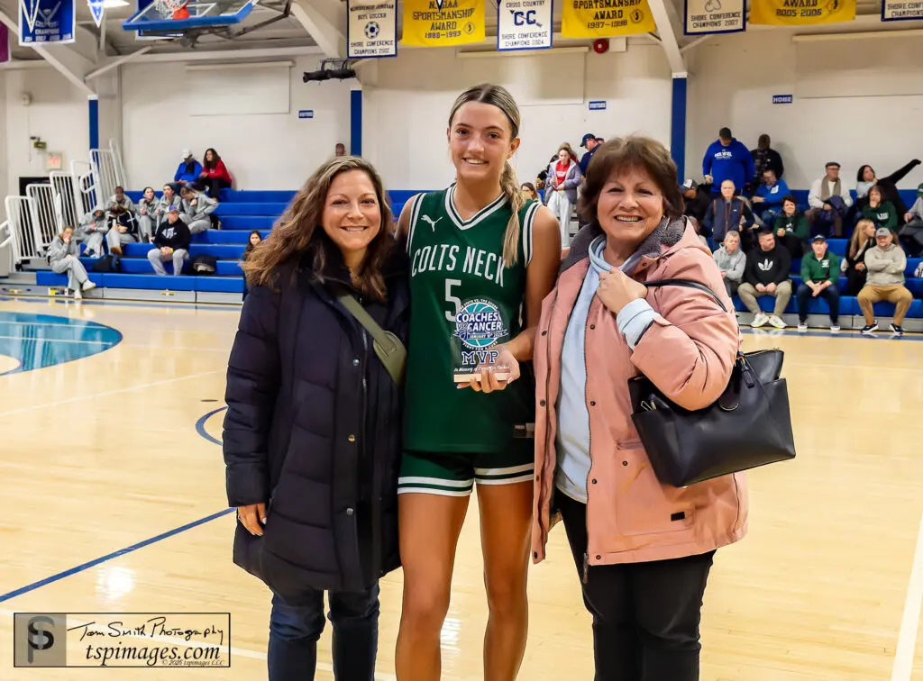 Gabby Bryce - Shore Sports Insider Gabby Bryce (middle) received the MVP award from former coach Ken Fischer's wife and daughter, Lynda and Lindsay. 1/10/26. Photo by Tom Smith - Gabby Bryce