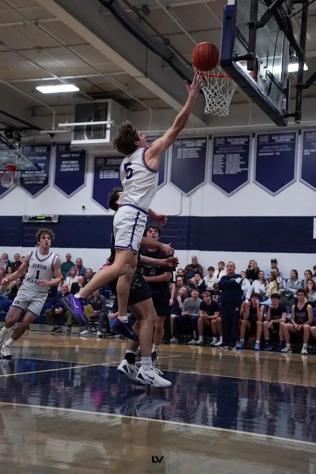 Rumson- Blake Ahmann - Shore Sports Insider Rumson-Fair Haven's Blake Ahmann finishes at the basket (Photo by @LuchIntronaVisuals) - Rumson- Blake Ahmann