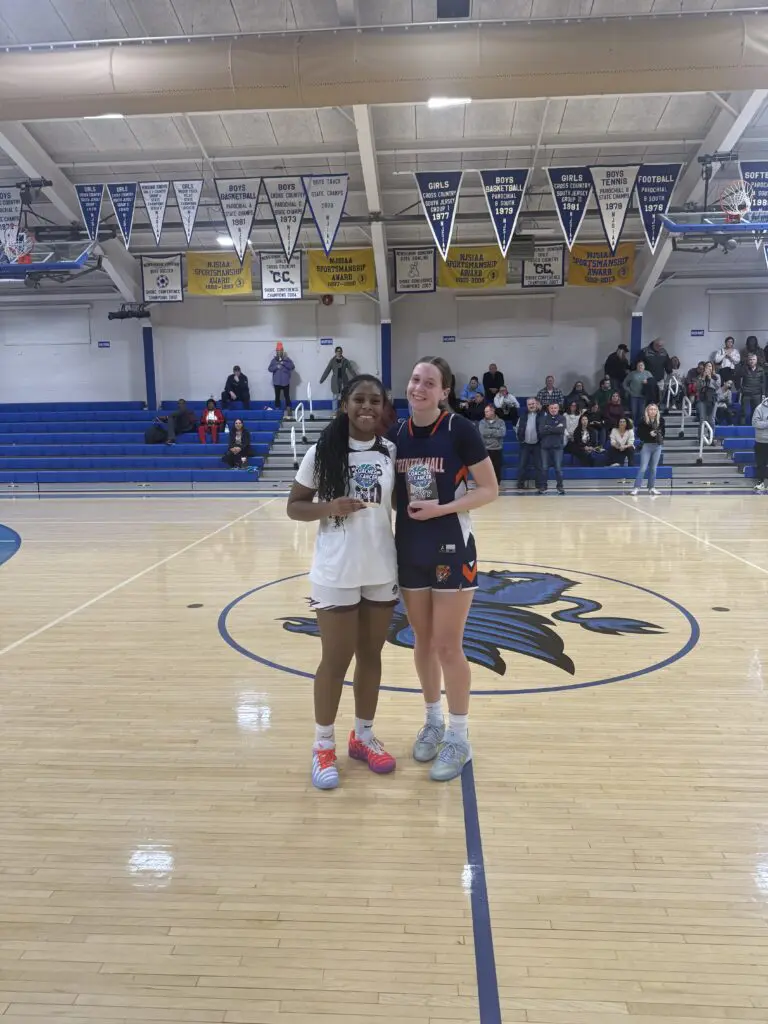 MVP TH/RBR - Shore Sports Insider Grace Feeney (right) and Synai Blychanton (left) named MVP in the Coaches vs Cancer at Donovan Catholic. 1/10/26. Photo by Nick Lowe - MVP TH/RBR