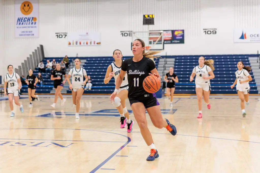 Rumson- Chloe Kelly - Shore Sports Insider Rumson guard Chloe Kelly on a fast break (Photo by Patrick Olivero) - Rumson- Chloe Kelly