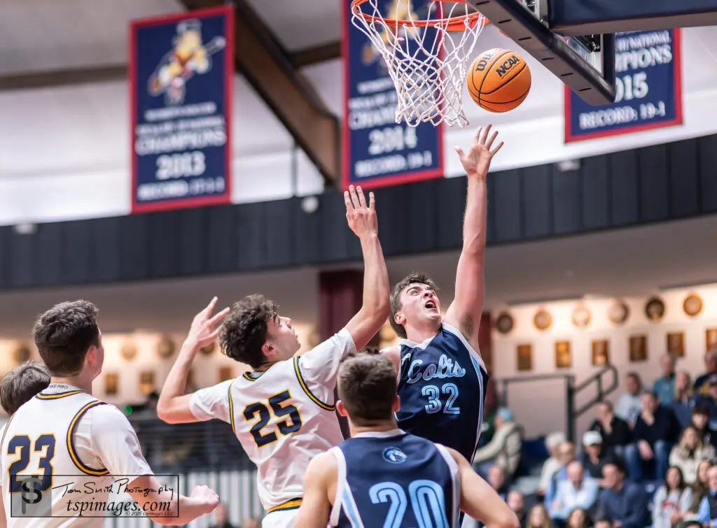 CBA Conor Andree - Shore Sports Insider CBA senior Connor Andree puts up a shot over Marlboro senior Drew Lubeck. (Photo: Tom Smith | tspsportsimages.com) - CBA Conor Andree