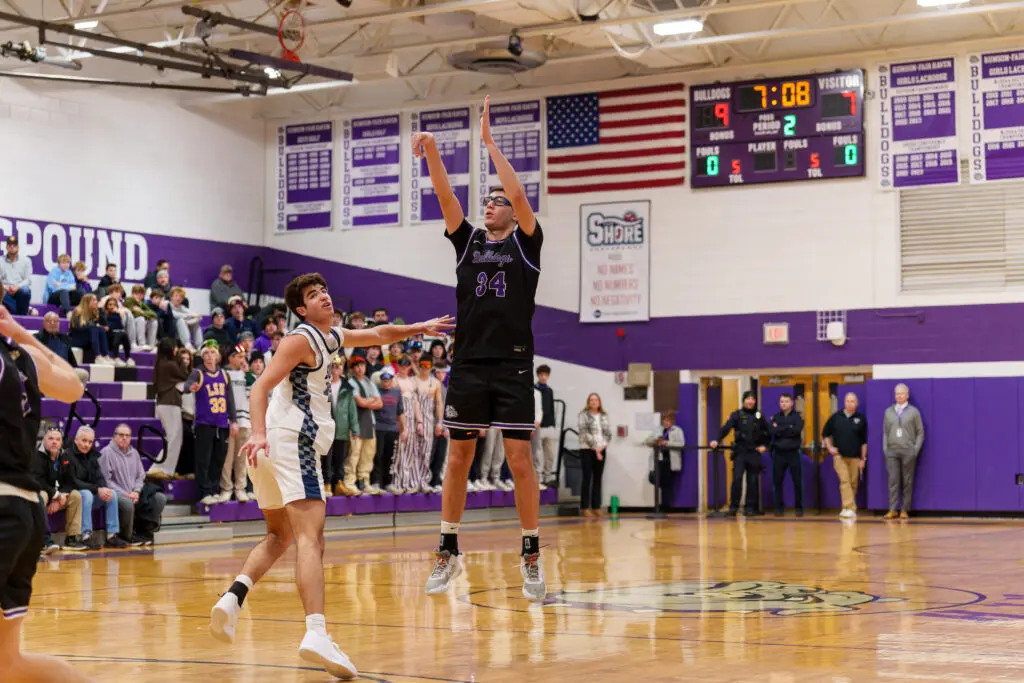 Manasquan at Rumson - Shore Sports Insider Rumson-Fair Haven senior Luke Cruz puts up a shot over Manasquan junior Logan Cleveland. (Photo: Patrick Olivero) - Manasquan at Rumson