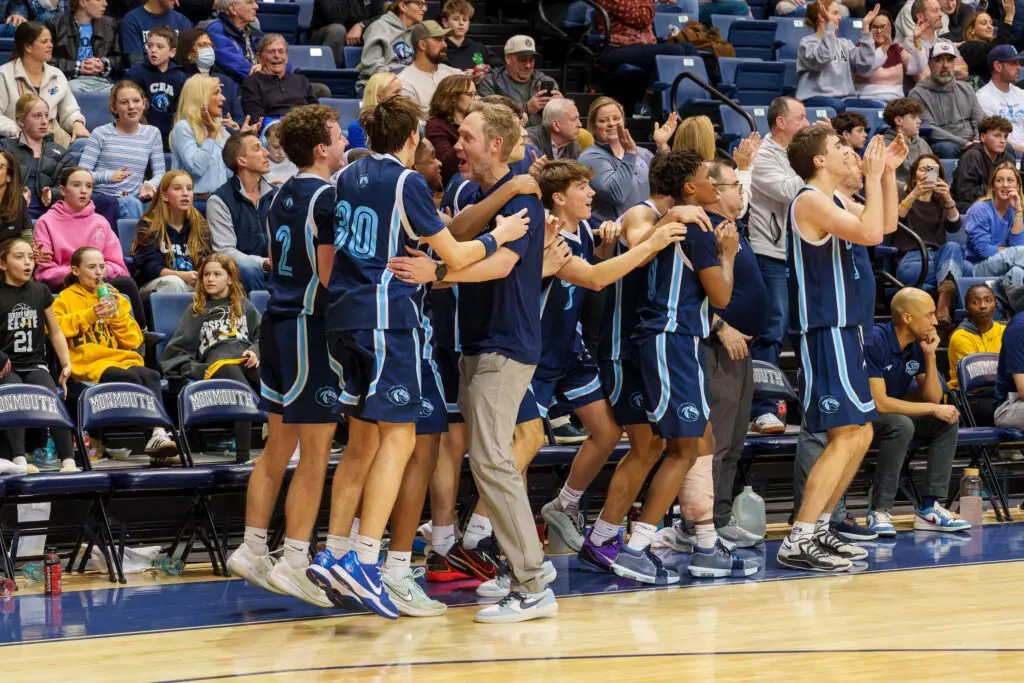 CBA vs. RBC SCT Final - Shore Sports Insider CBA coach Brian Lynch celebrates with his players near the final buzzer of CBA's Shore Conference Tournament championship victory over Red Bank Catholic.(Photo: Patrick Olivero) - CBA vs. RBC SCT Final