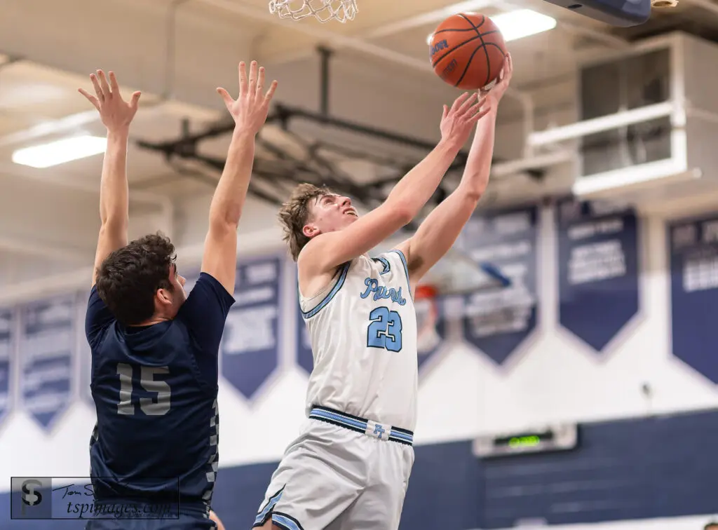 Freehold Twp. at Manasquan - Shore Sports Insider Freehold Township junior Jake Schultzel drives by Manasquan sophomore Noah Matuch. (Photo: Tom Smith | tspsportsimages.com) - Freehold Twp. at Manasquan