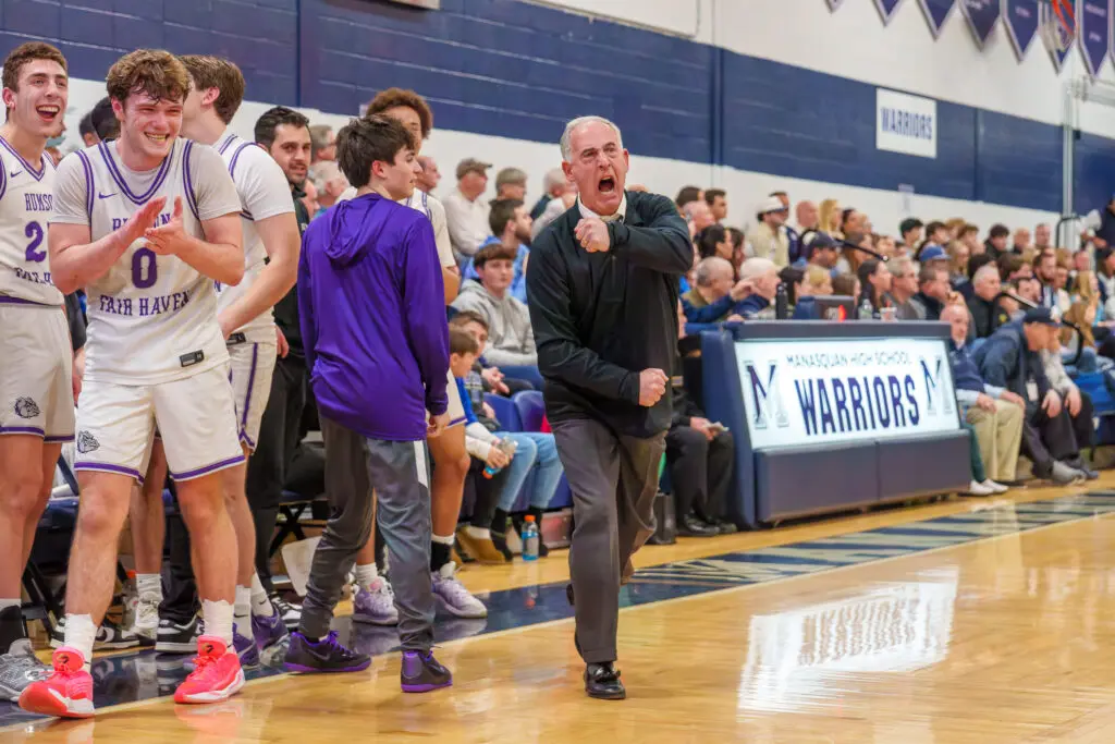 Rumson at Manasquan - Shore Sports Insider Rumson-Fair Haven coach George Sourlis pumps his fist during the second half of his team's NJSIAA sectional final win at Manasquan. (Photo: Patrick Olivero) - Rumson at Manasquan