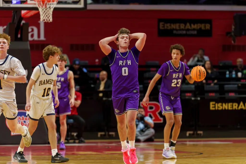 Rumson vs Ramsey - Shore Sports Insider Rumson-Fair Haven senior Luke Lydon (0) with freshman Clint Martin holding the ball.(Photo: Patrick Olivero) - Rumson vs Ramsey