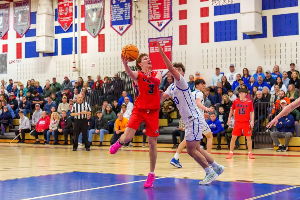 Holmdel at Wall - Shore Sports Insider Wall senior Joey Ambeozy operates against Holmdel senior Dylan Zammit. (Photo: Patrick Olivero) - Holmdel at Wall