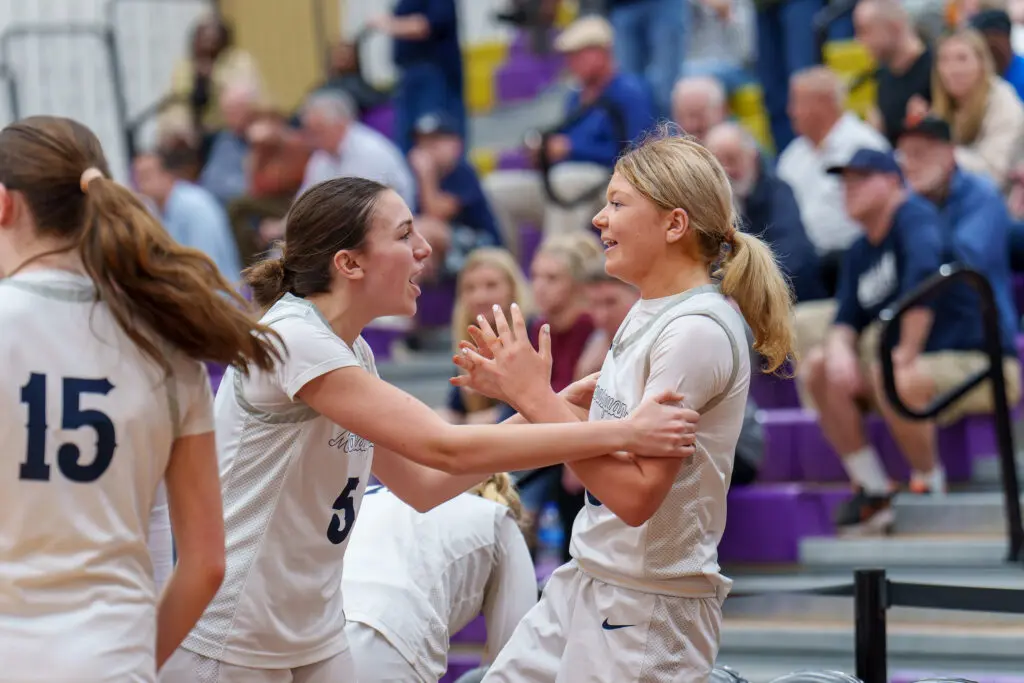 Looney - Shore Sports Insider Paige Donnelly (Left) celebrating with Shannon Looney (right) after Looney put Manasquan up 33-31 in the 4th quarter. 3/10/26 Photo by Patrick Olivero - Looney