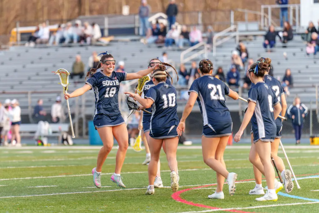 Middletown South's Hayley Jamison celebrates with her teammates (Photo by Patrick Olivero) - Middletown South's Hayley Jamison