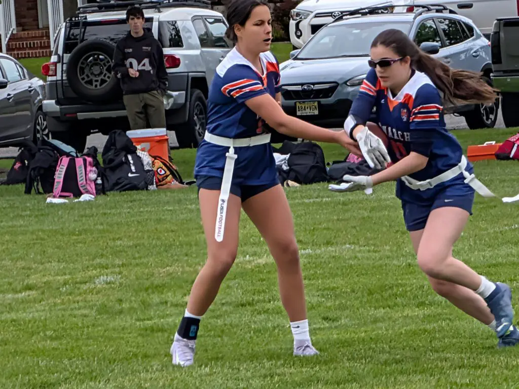Sonia DeRosa and Maddie Dougherty - Shore Sports Insider Sophomore quarterback Sonia DeRosa threw five touchdown passes and Maddie Dougherty added a touchdown catch and a touchdown run in the win over Neptune (Photo by Scott Stump) - Sonia DeRosa and Maddie Dougherty