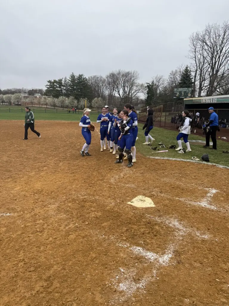 Holmdel - Shore Sports Insider Holmdel celebrating after beating Raritan 6-2. 4/2/26 Photo by Nick Lowe - Holmdel