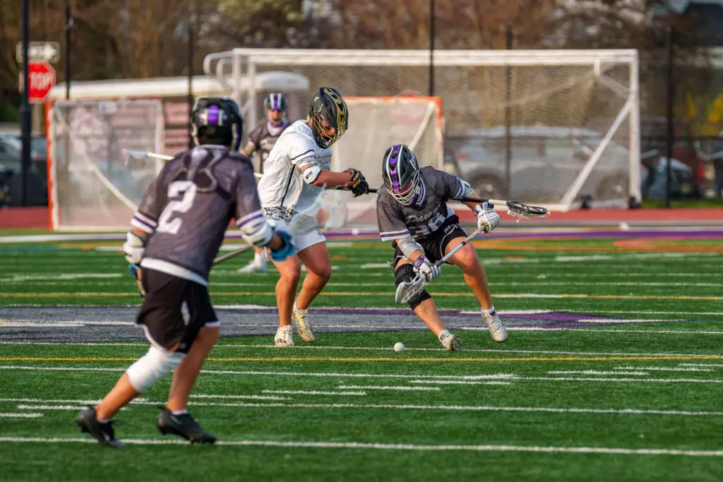 Rumson Jaden Cavise - Shore Sports Insider Rumson-Fair Haven's Jaden Cavise wins a face-off (Photo by Patrick Olivero) - Rumson Jaden Cavise
