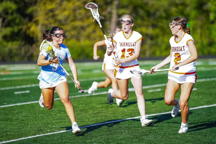 Barnegat Grant and Carroll - Shore Sports Insider Barnegat's Molly Carroll (2) and Kylei Grant (13) defend Toms River East's Gianna Pascale (9) (Photo by luch.visualz) - Barnegat Grant and Carroll