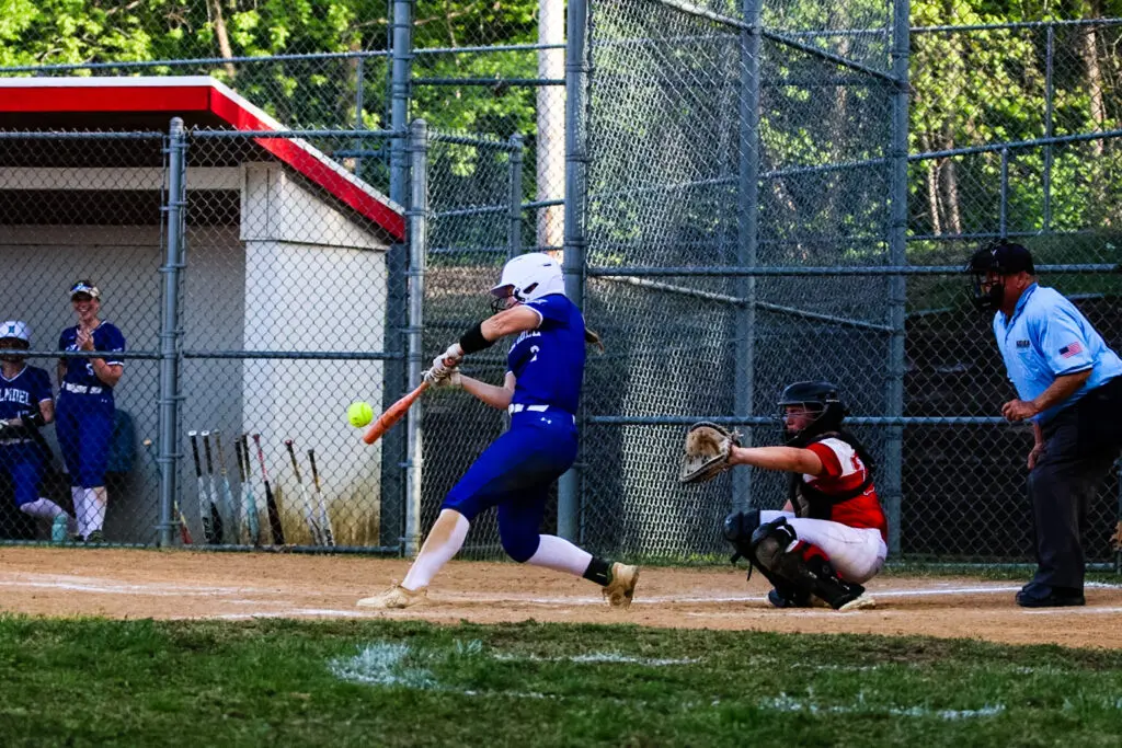 Holmdel Molly Debias - Shore Sports Insider Holmdel's Molly Debias belting a solo home run to start the game (Photo by Samantha Mayer) - Holmdel Molly Debias