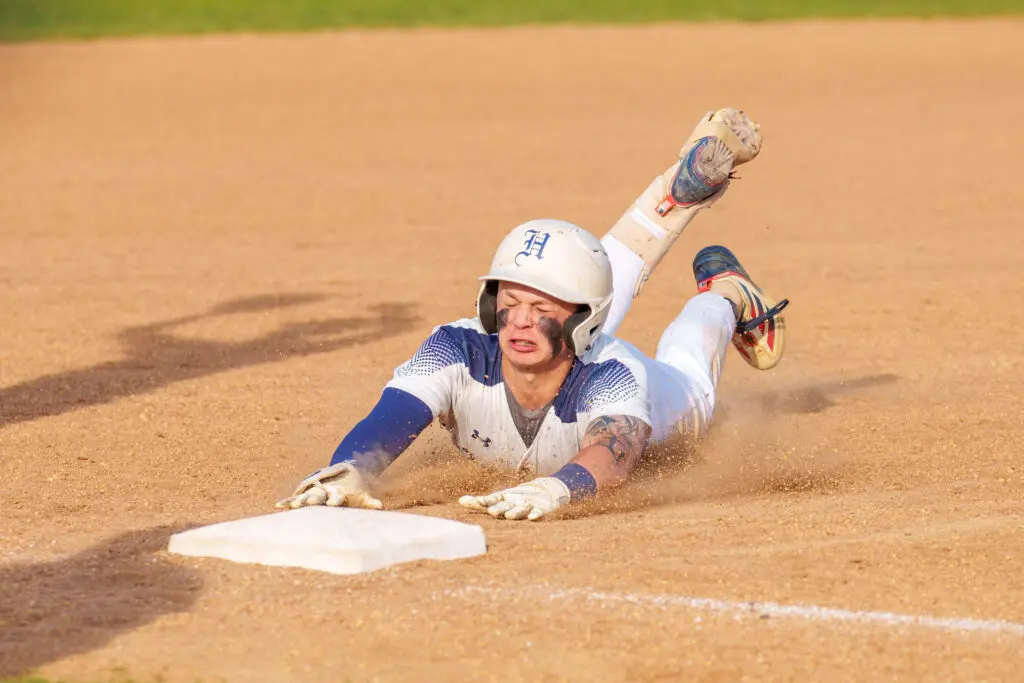 Ranney vs. Howell MCT - Shore Sports Insider Howell senior Ryan Todisco dives into third after driving in two runs during the Monmouth County Tournament final vs. Ranney. (Photo: Patrick Olivero) - Ranney vs. Howell MCT