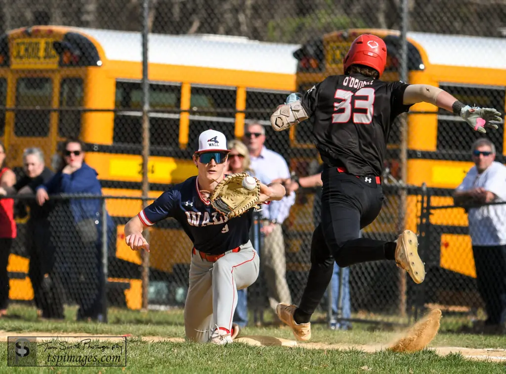 Wall Luke Dana - Shore Sports Insider Wall sophomore Luke Dana takes the throw at first as Jackson's Aidan Alu lunges for the bag. (Photo: Tom Smith | tspsportsimages.com) - Wall Luke Dana