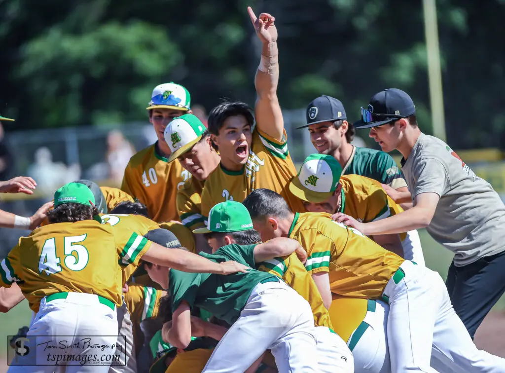 Brick Mem vs Delsea - Shore Sports Insider Tyler Garbooshian raises his hand in the middle of Brick Memorial's winning scrum following its win vs. Delsea in the NJSIAA Group 3 semifinal. (Photo: Tom Smith | tspsportsimages.com) - Brick Mem vs Delsea
