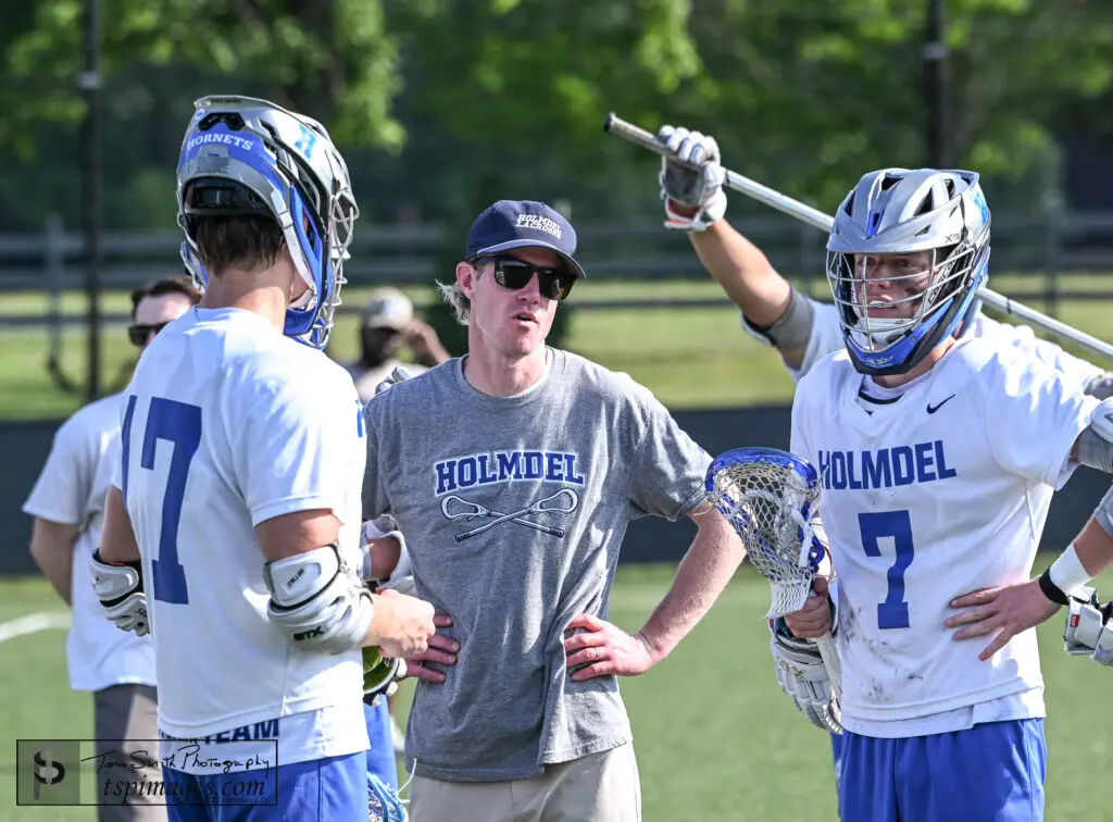 Holmdel Brendan Quinn - Shore Sports Insider Holmdel head coach Brendan Quinn speaking with his players (Photo: Tom Smith | tspsportsimages.com) - Holmdel Brendan Quinn