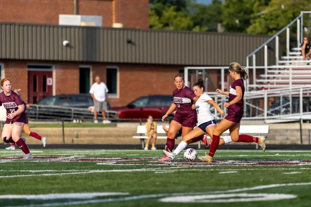 TRS Defense - Shore Sports Insider Morgan Notaro gets a shot off in the first half for Freehold Township against No. 1 Toms River South. 9/1/26 (Photo by David Phillips/Framegrabs LLC) - TRS Defense