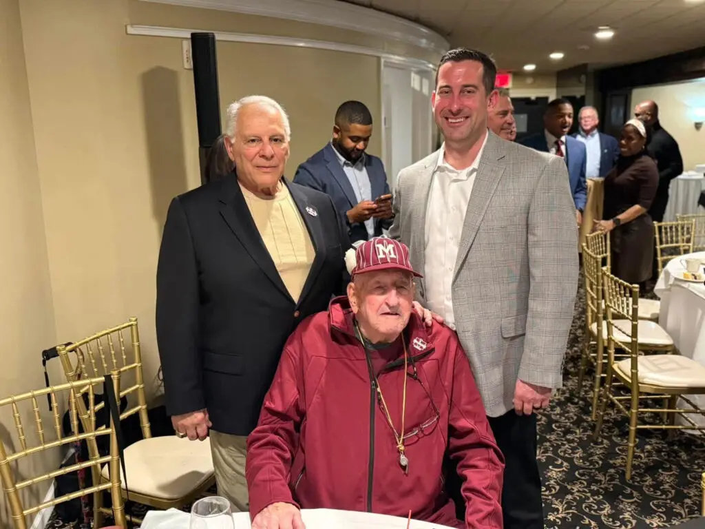 Barry Rizzo - Shore Sports Insider Matawan coaching legend Barry Rizzo (center) has died at 94. He is shown here with Matawan's all-time wins leader, Joe Martucci (left) and current Huskies head coach Matt Walsh. (Photo by the Matawan Football Alumni Association) - Barry Rizzo