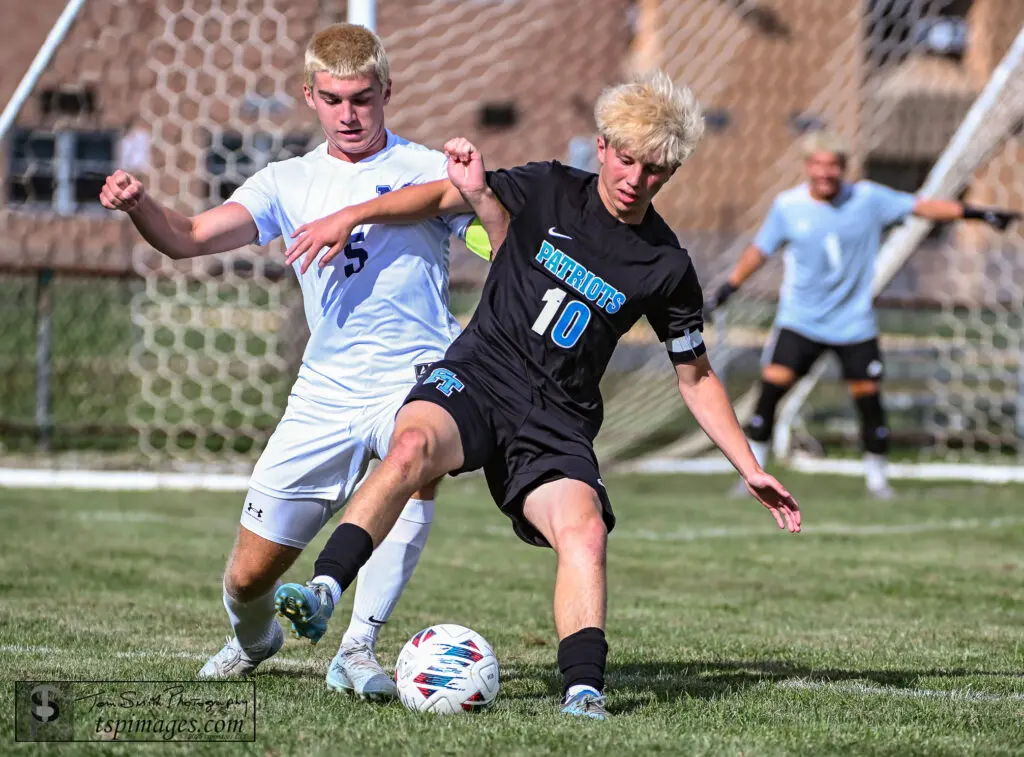 Freehold Twp Chase Melcher - Shore Sports Insider Freehold Township junior Chase Melcher battling Manasquan senior John Visceglia. (Photo: Tom Smith | tspsportsimages.com) - Freehold Twp Chase Melcher