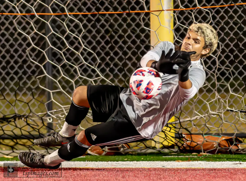 Manasquan Quinn Petrulla - Shore Sports Insider Manasquan senior Quinn Petrulla makes the save that clinches Manasquan a trip tot the Shore Conference Tournament final. (Photo: Tom Smith | tspsportsimages.com) - Manasquan Quinn Petrulla