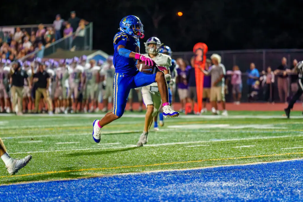 Alex Staten - Shore Sports Insider Alex Staten leaps into the end zone to complete an 18-yard TD catch in the second quarter. (Photo by Patrick Olivero) - Alex Staten