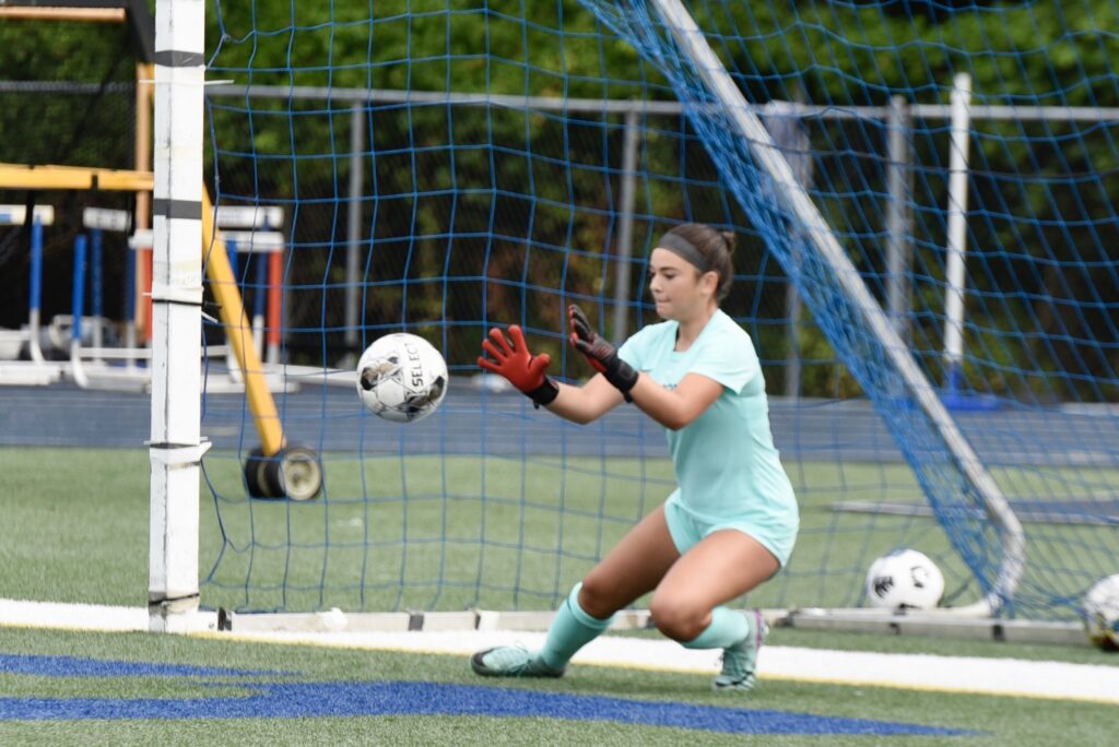 Freshman Julianna Fiore first start against Middletown North. (Photo by Eric Braun) - Midd South - Fiore