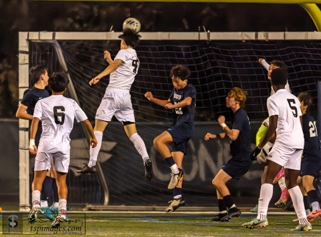 Long Branch senior Evan Santiago heads in Long Branch's first goal at Middletown South. (Photo: Tom Smith | tspimages.com) - Long Branch Evan Santiago goal