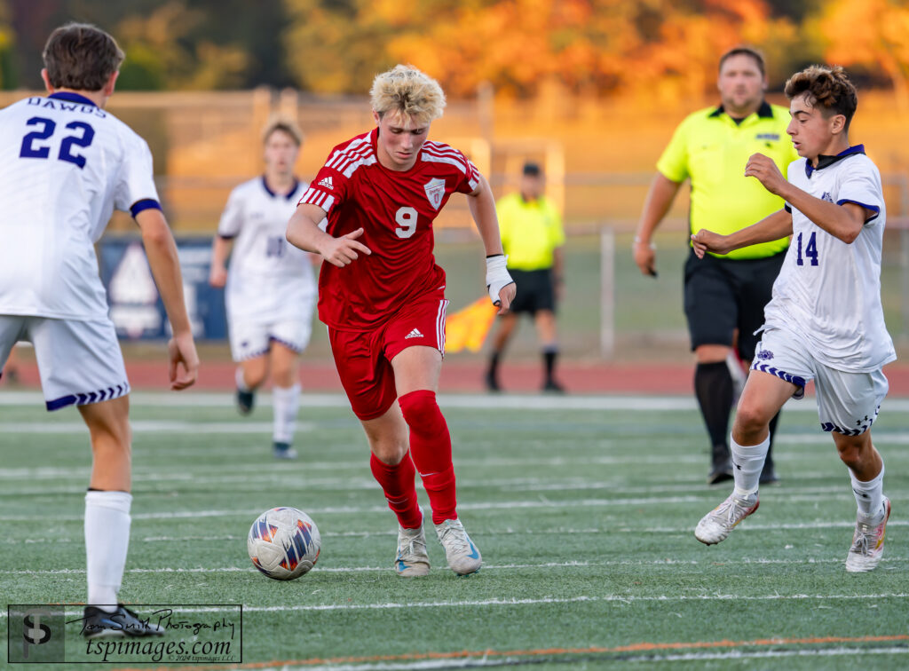 Ocean sophomore Connor Shaw defended by Rumson-Fair Haven junior Sal Taddeo. (Photo: Tom Smith | tspimages.com) - Rumson at Ocean