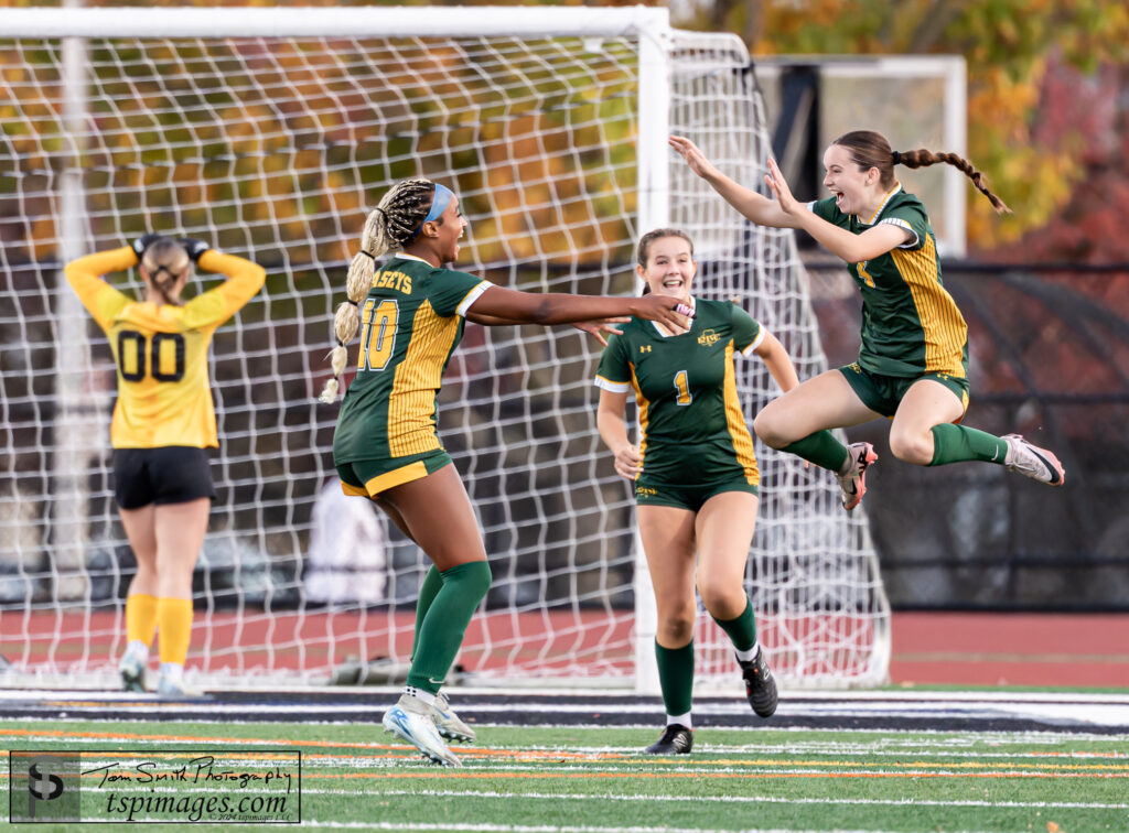 Lexi Sinatra (Right) jumps in celebration after scoring the golden goal against SJV. (Photo by Tom Smith) - RBC Girls Soccer