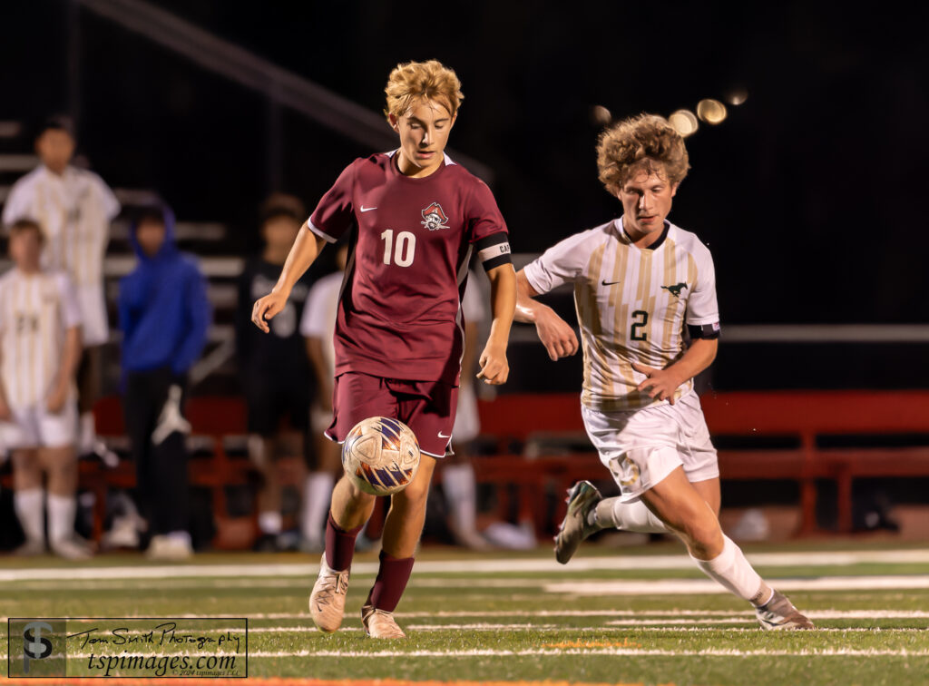 Red Bank junior Alex Salvo (10) defended by Brick Memorial junior Paul DiRosa. (Photo: Tom Smith | tspimages) - RBR Alex Salvo