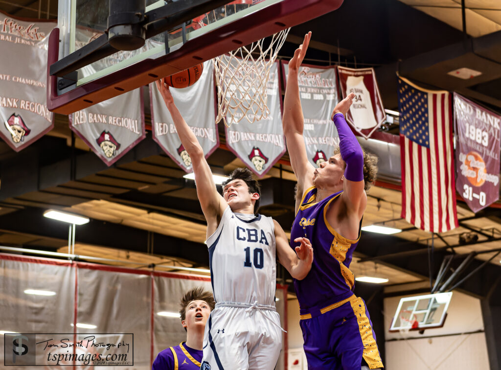 CBA senior Kevin Pikiell drives on St. Rose's Matt Hodge during the 2024 Shore Conference Tournament semifinals. (Photo: Tom Smith | tspimage.com) - Kevin Pikiell CBA