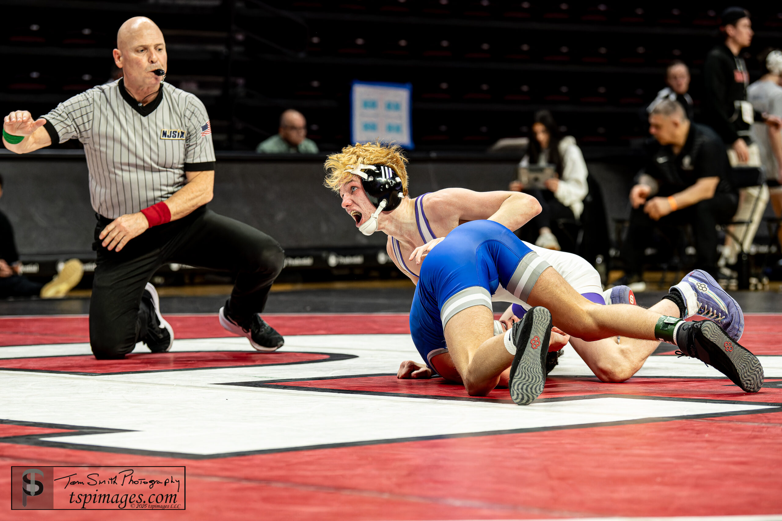 Rumson senior Elijah Bayne clinched the NJSIAA Group 2 state title with a pin at 120 pounds in the final bout. (Photo credit: Tom Smith | tspsportsimages.com). - Elijah Bayne, Rumson-Fair Haven Wrestling