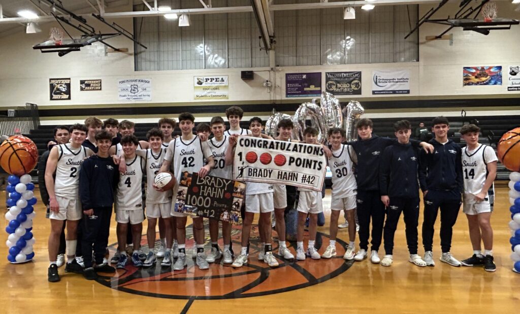 Middletown South senior Brady Hahn celebrates his 1,000th career point. (Photo courtesy: Mike Iasparro/Middletown South boys basketball) - Brady Hahn Midd South 1000