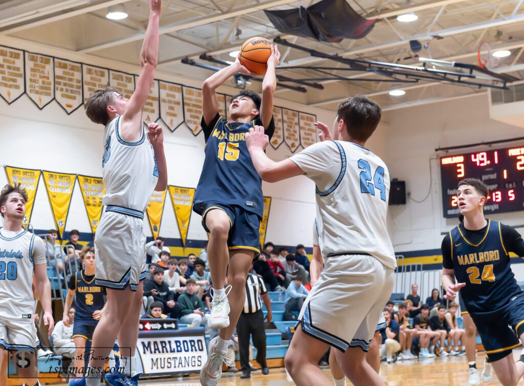Marlboro Nolan Gong - Shore Sports Insider Marlboro sophomore Nolan Gong drives into the teeth of the Freehold Township defense. (Photo: Tom Smith | tspimages.com) - Marlboro Nolan Gong