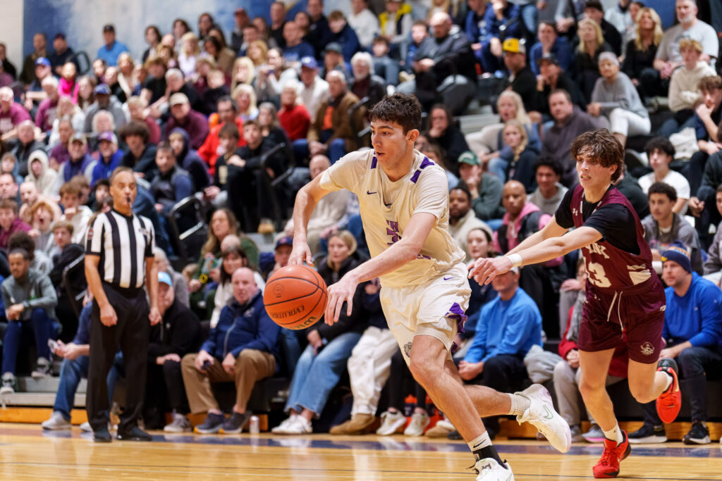 Rumson junior Luke Cruz works around Red Bank sophomore Justin Valentino. (Photo: Patrick Oliveira) - RFH vs Red Bank SCT