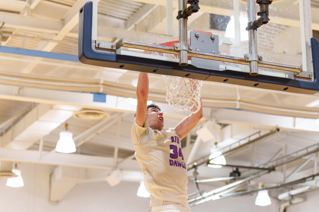 Rumson junior Luke Cruz throws down a dunk. (Photo: Patrick Oliveira) - RFH vs Red Bank SCT