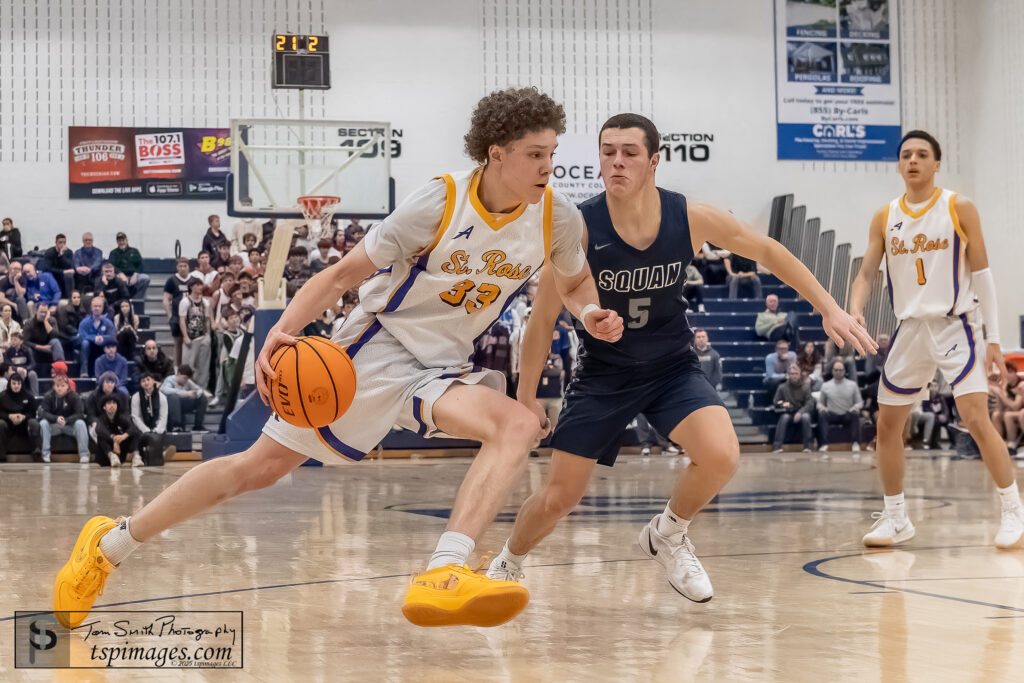 St. Rose junior Jayden Hodge guarded by Manasquan senior Brandon Kunz. (Photo: Tom Smith | tspimages.com) - St. Rose Jayden Hodge