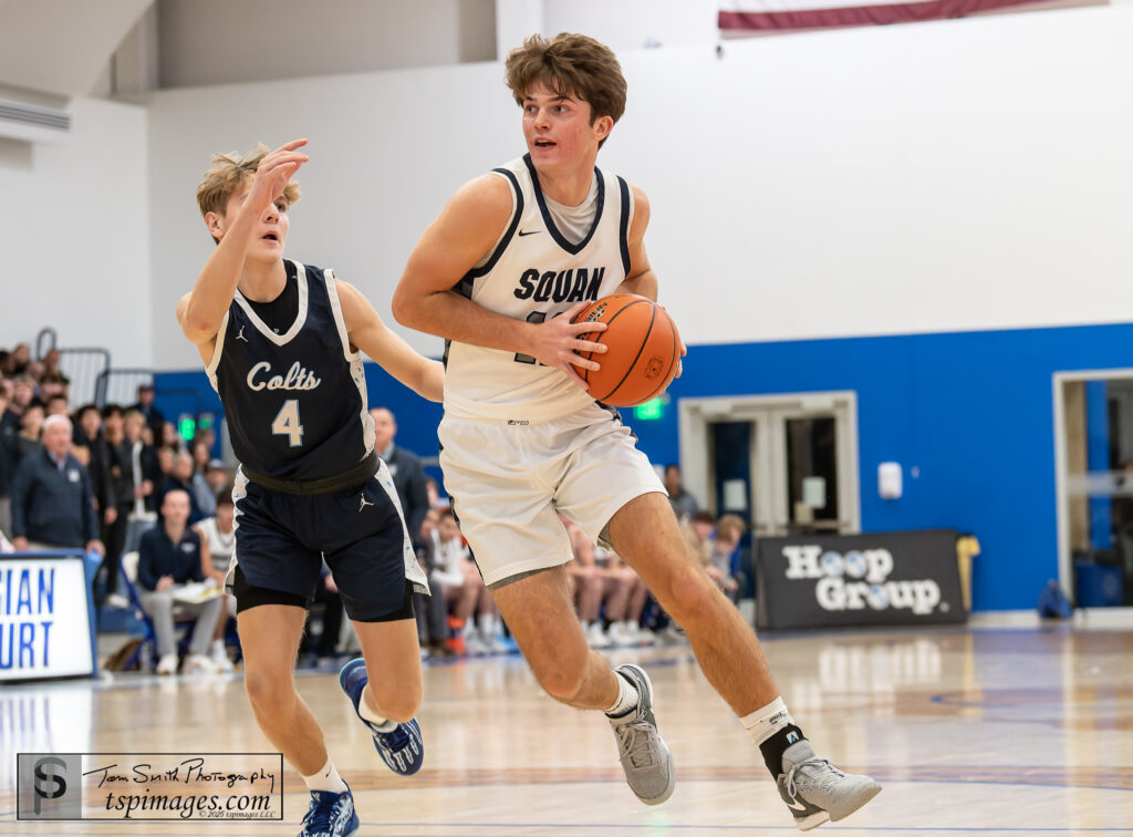 Manasquan senior Griffin Linstra drives by CBA junior Gavin Marlin. (Photo: Tom Smith | tspimages.com) - CBA vs Manasquan