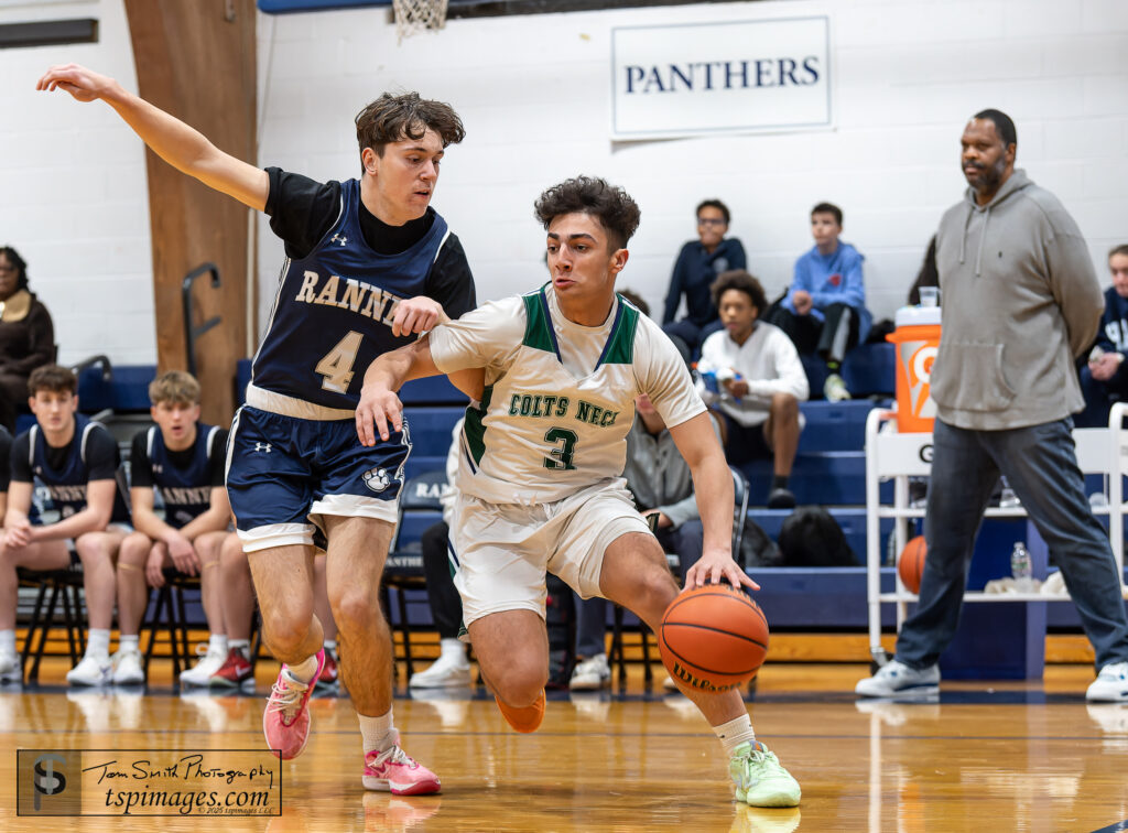 Colts Neck senior Dan Buoncore drives on Ranney senior Ethan Cherrier. (Tom Smith | tspimages.com) - Colts Neck Dan Buoncore