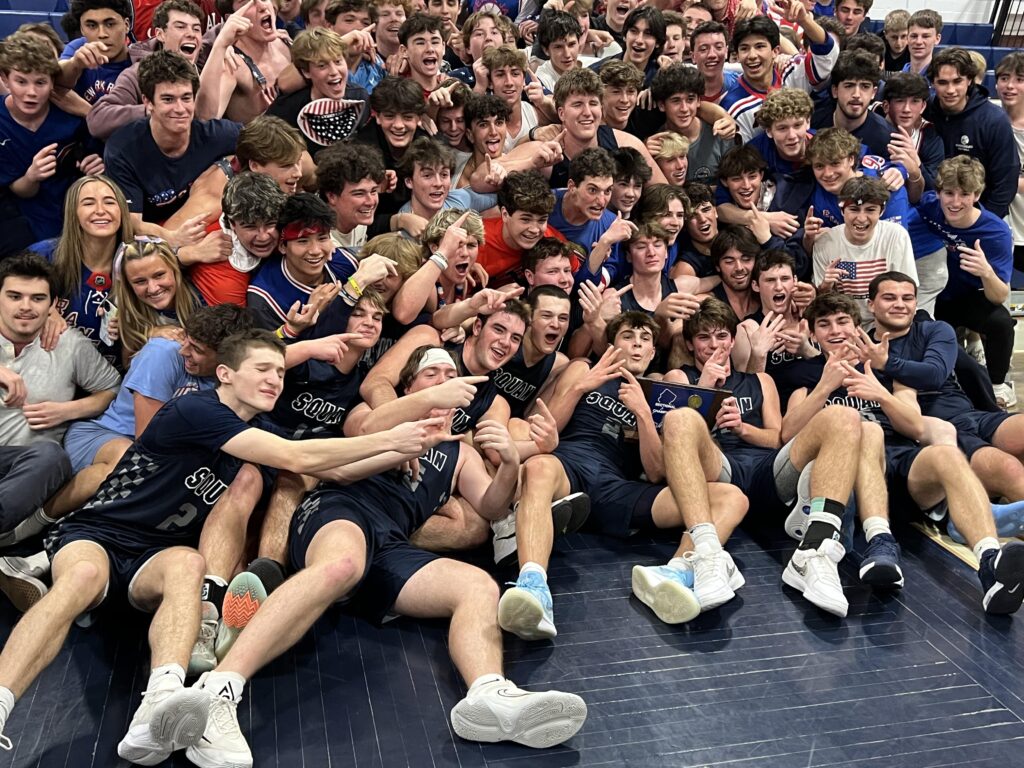 The Manasquan boys basketball team celebrates its sixth straight sectional title with the students. (Photo: Matt Manley) - Manasquan CJ2 Champs