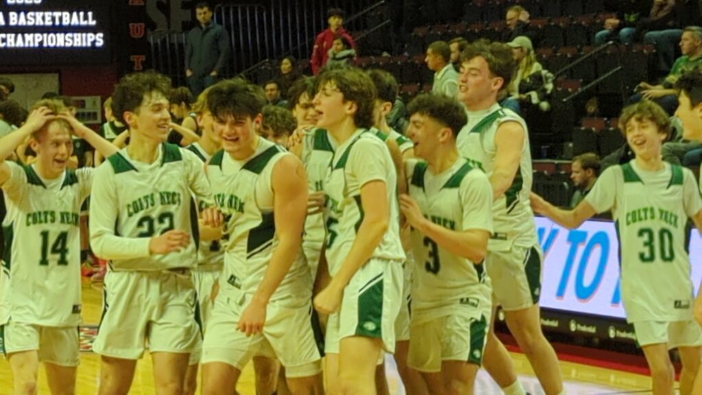 Colts Neck celebrates its first NJSIAA Group title after beating Ramapo 54-46 in the Group 3 championship game. (Photo by Scott Stump)  - Lukas Sloane Colts Neck