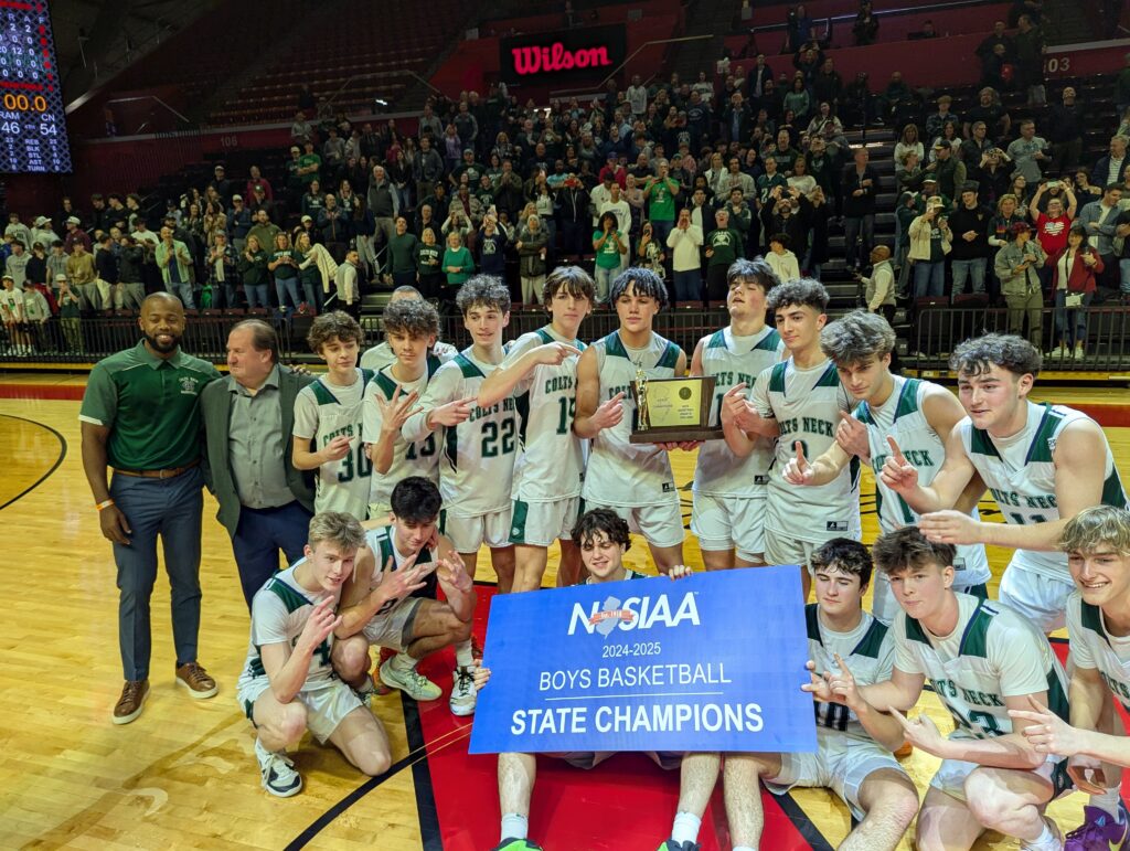 Colts Neck celebrates its first NJSIAA Group title after beating Ramapo 54-46 in the Group 3 championship game. (Photo by Scott Stump) 